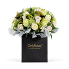 Floral arrangement in a black 'Only Roses' bag on a white background