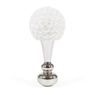 Decorative object with white spherical top and silver base on a white background