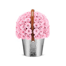 Basket filled with pink roses on a white background