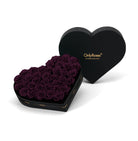 Heart-shaped box of purple roses with 'OnlyRoses' branding on a white background