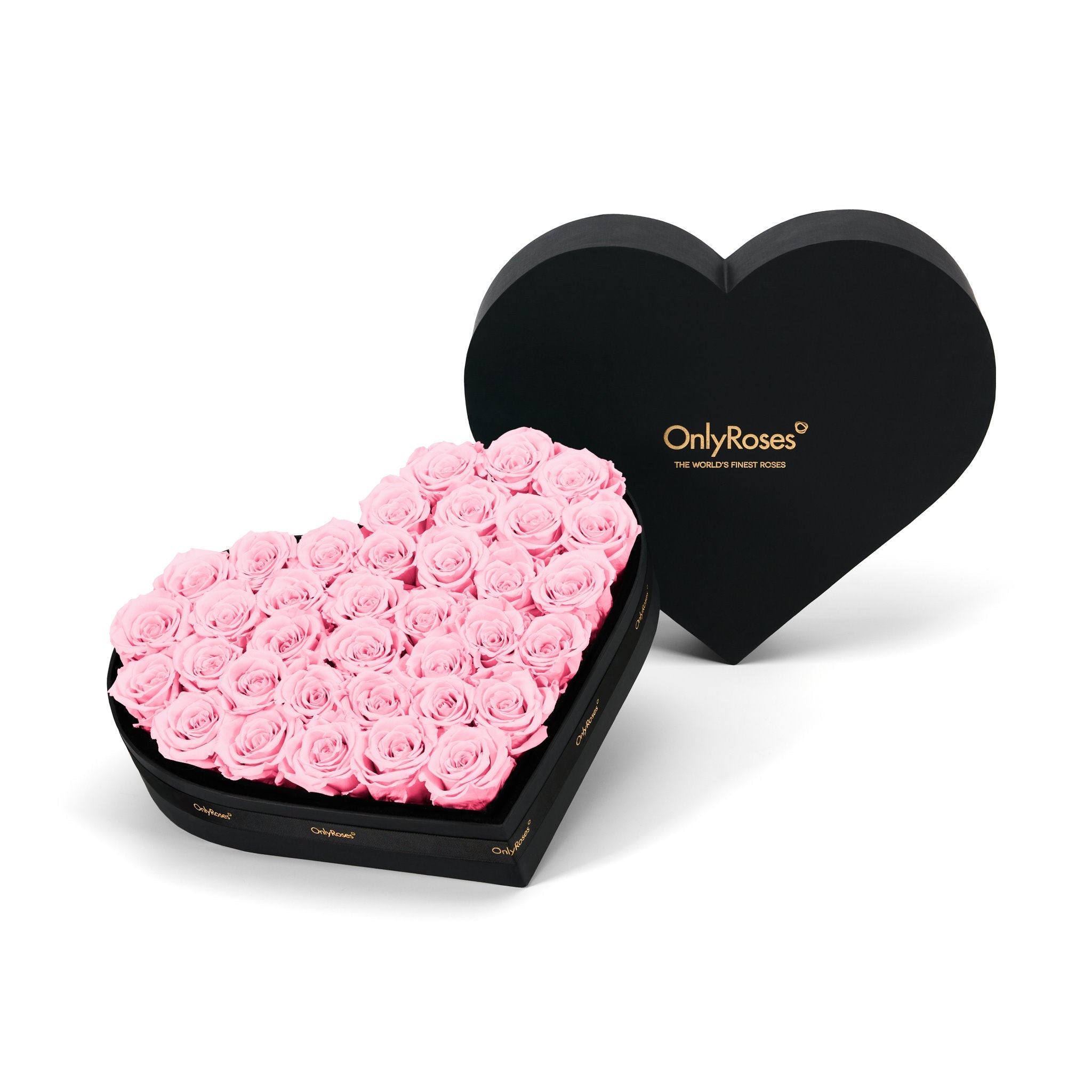 Heart-shaped box of pink roses with 'OnlyRoses' branding on a white background
