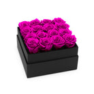 Black box with pink roses on a white background